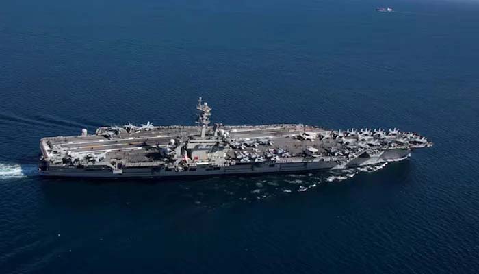 US naval fleet heads to Middle East as Trump warns Iran